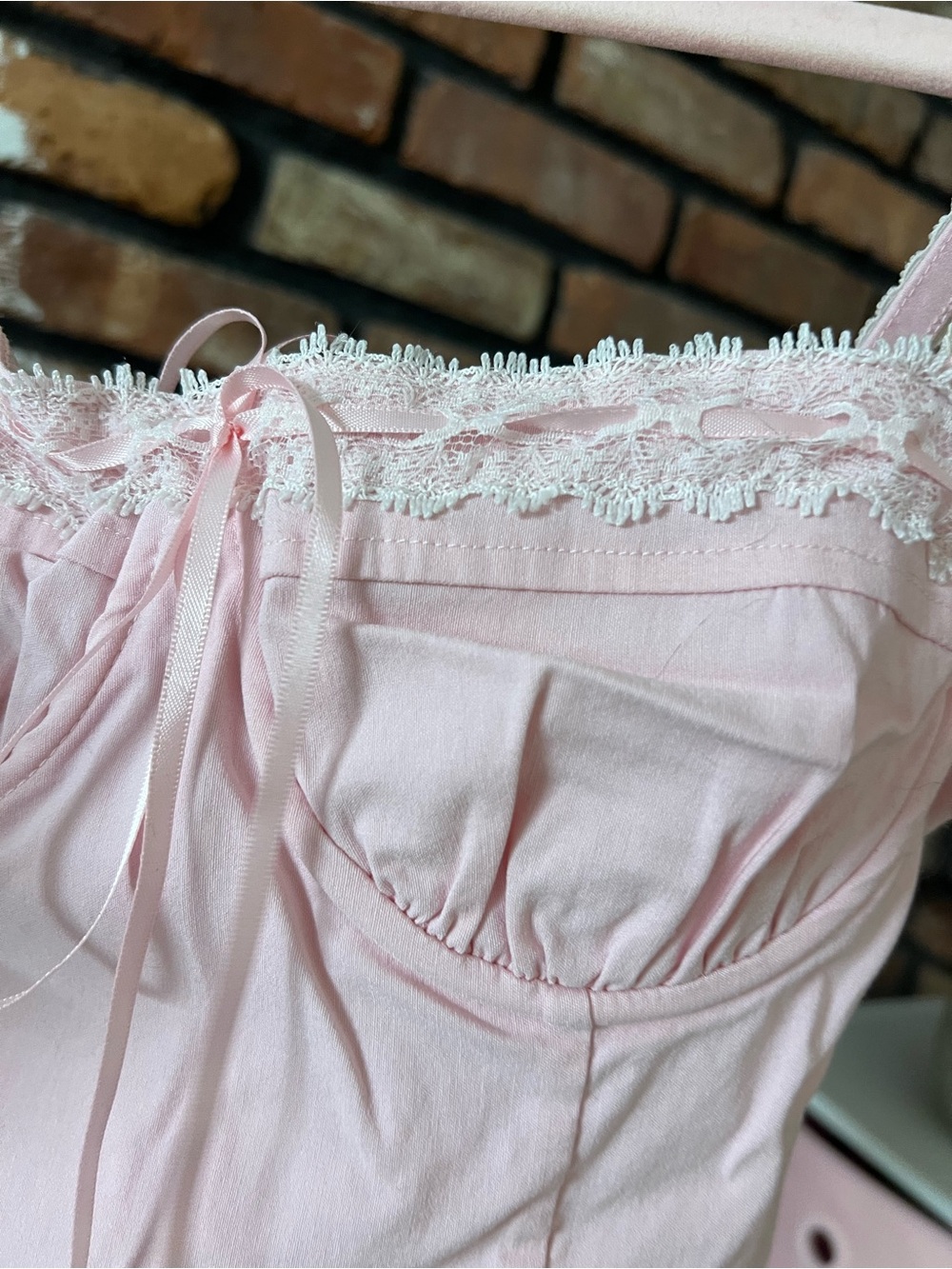 Beverly and Beck/ Urban Outfitters 
Delicate Lace-Trim Pink Bustier Camisole